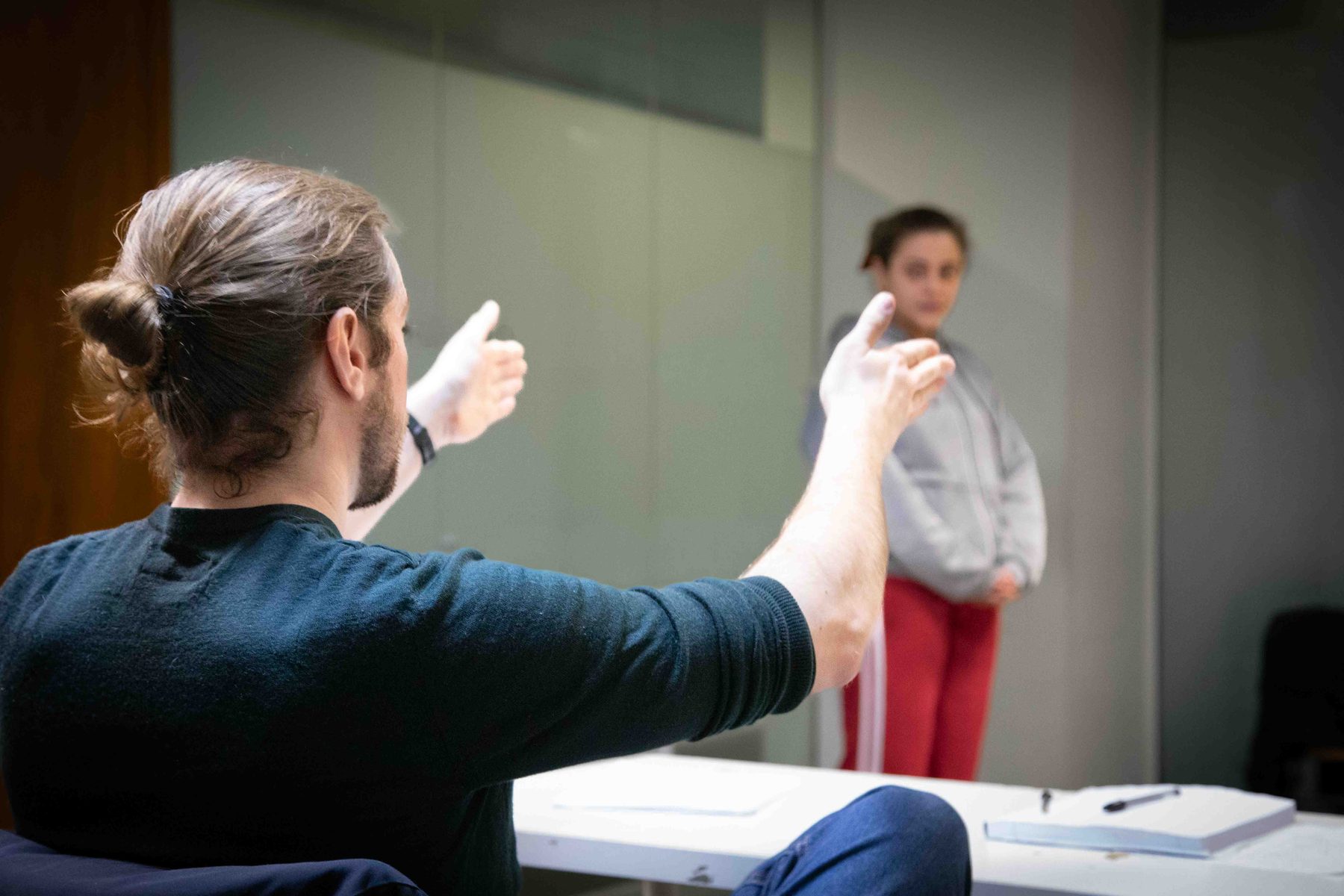 Rich directing an actor through a scene