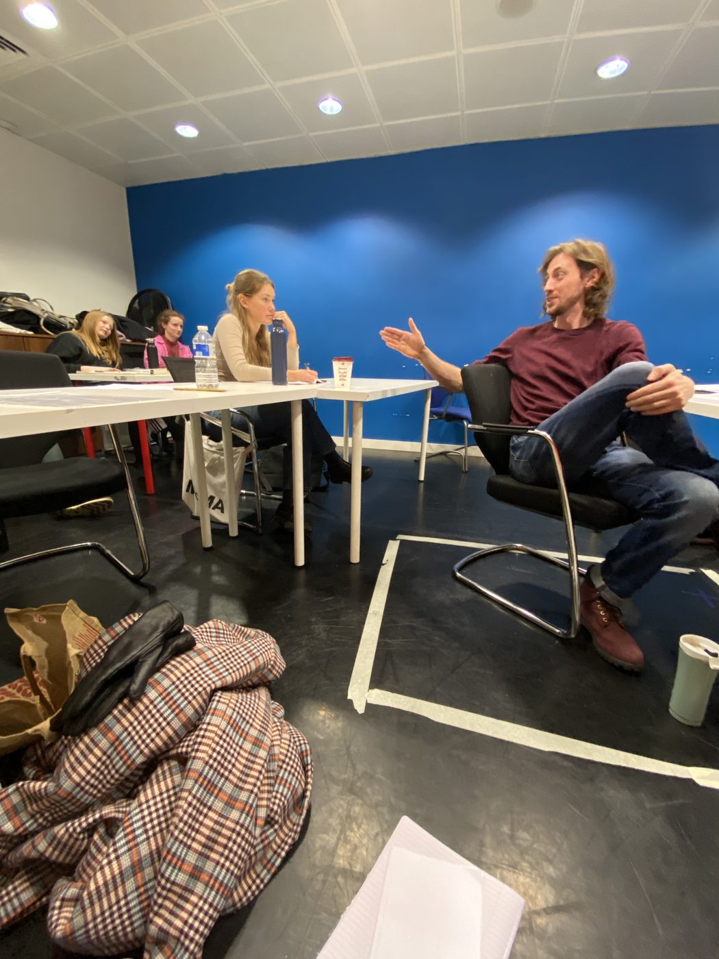 Rich working with the class around the table