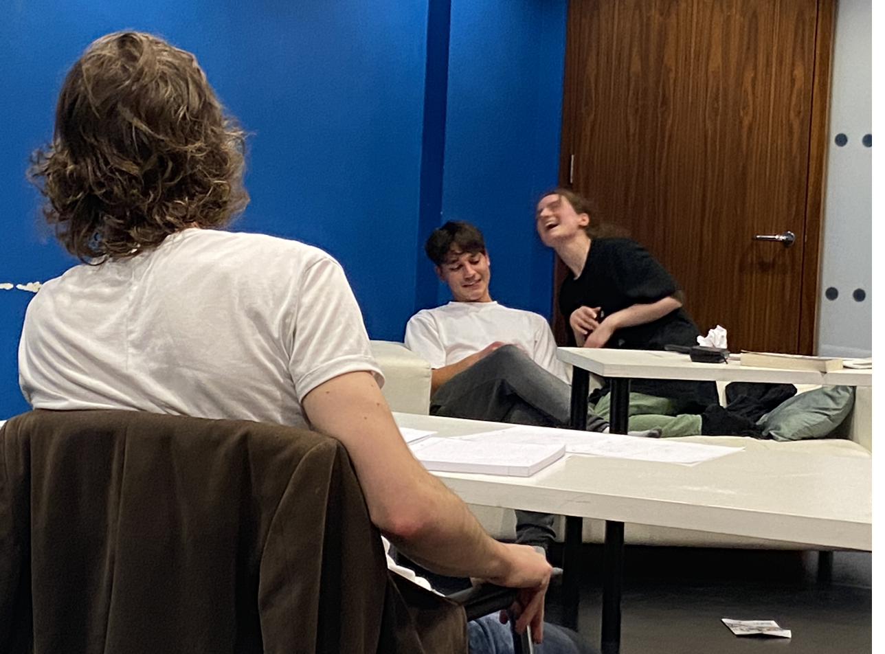 Rich watching a scene in class