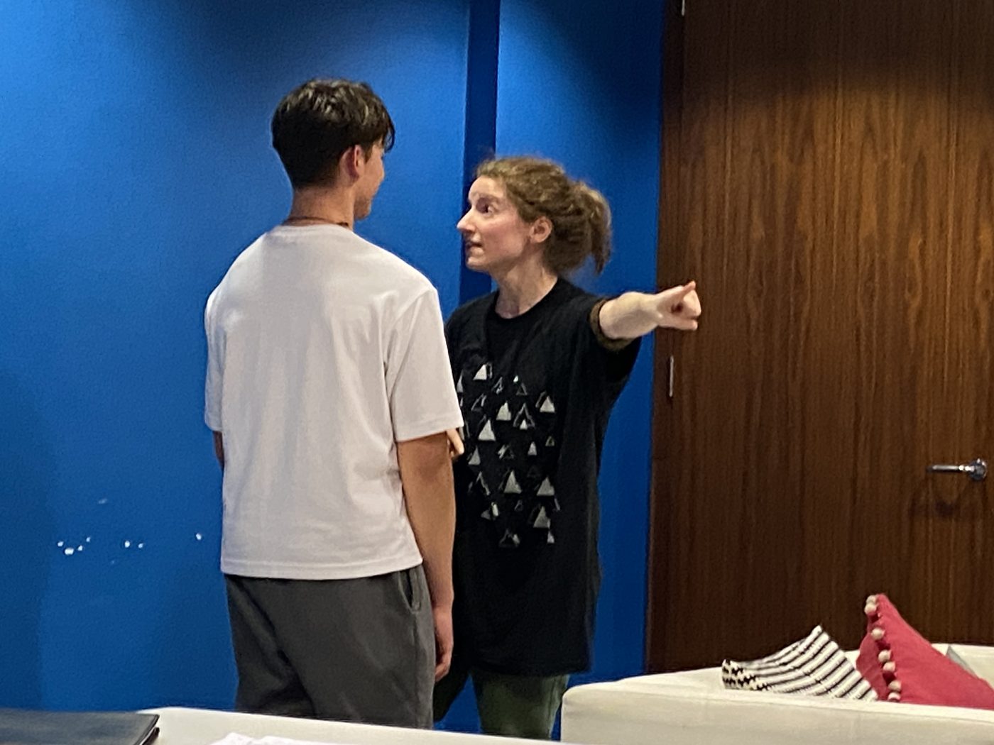 Two actors in a scene in class