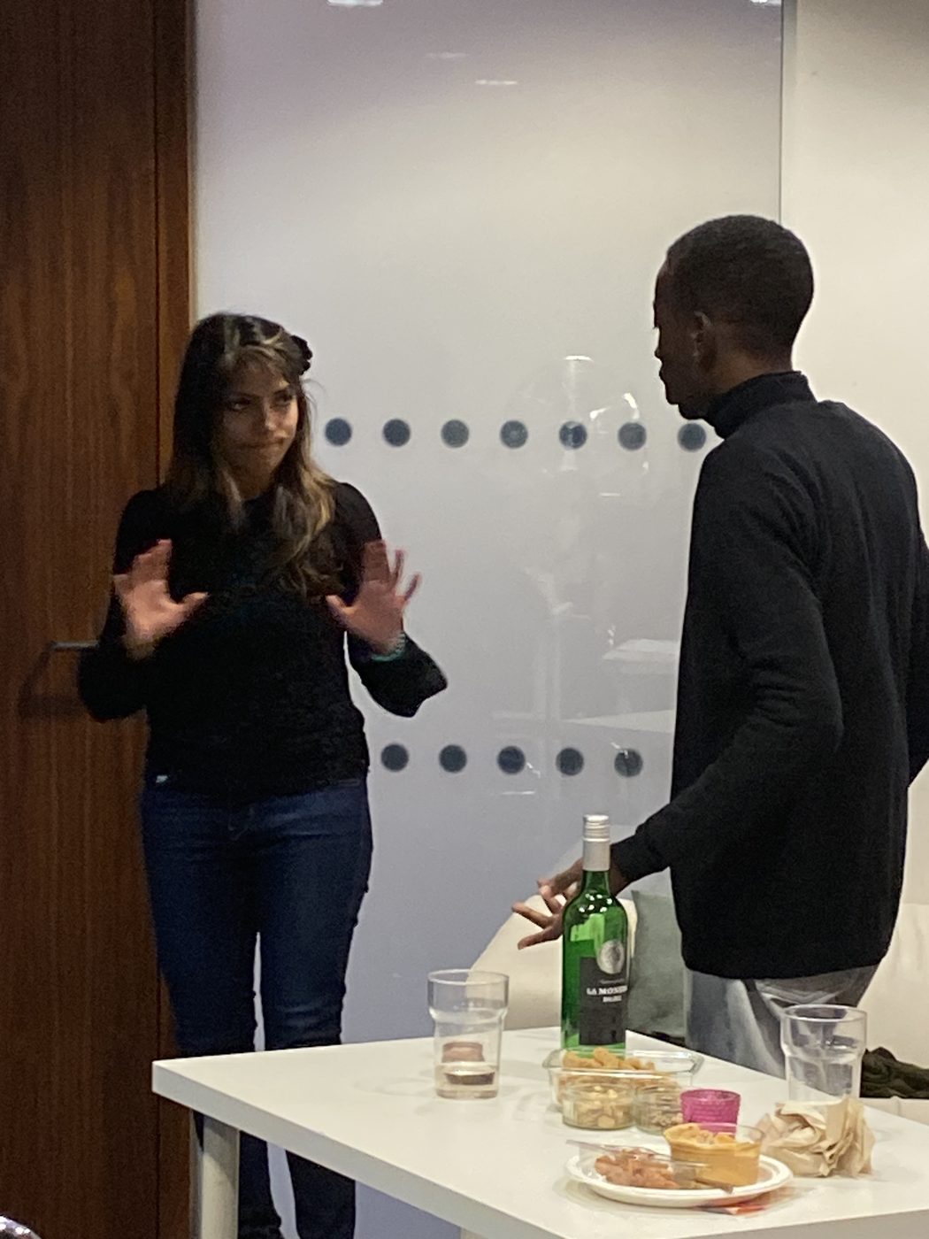 Actors working a scene in class